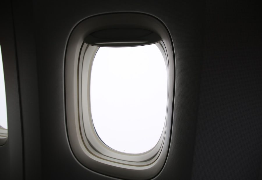 Aircraft cabin on an international flight arranged by Victoria Tour outbound services